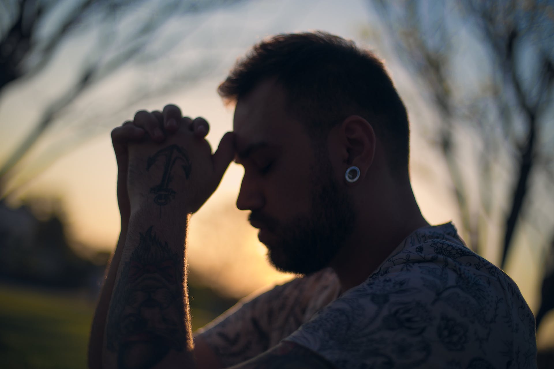 Young man reflecting on his emotions