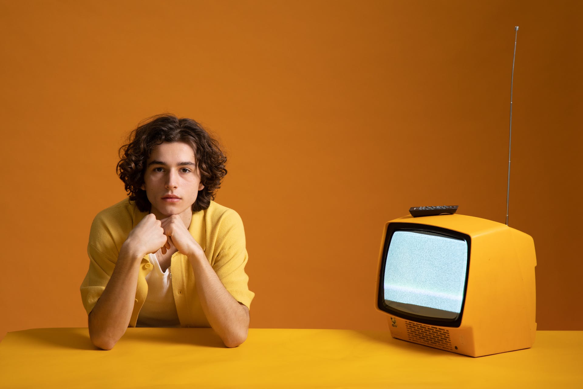 Young man staring at the photographer