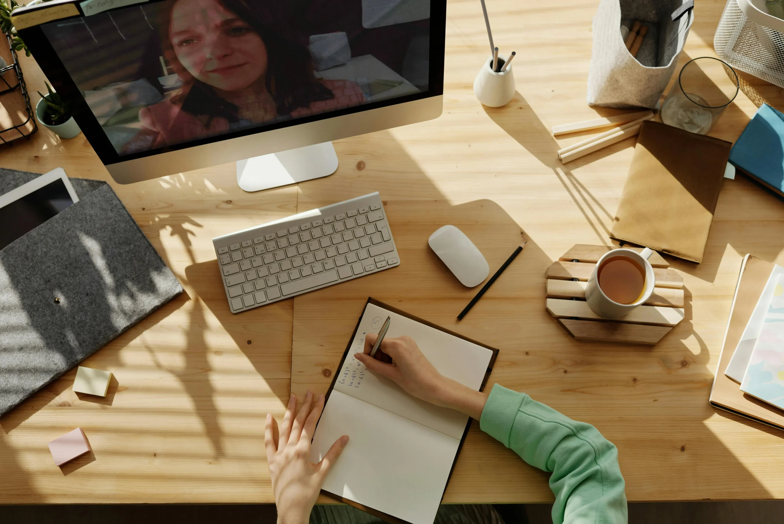 Woman taking notes of a meeting